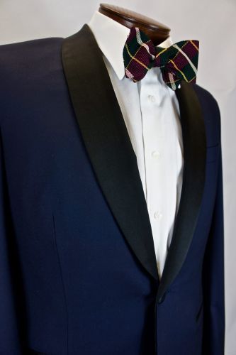 Bhambi's master tailor hand-sewing a bespoke suit in the New York City workshop – custom menswear crafted in Midtown Manhattan