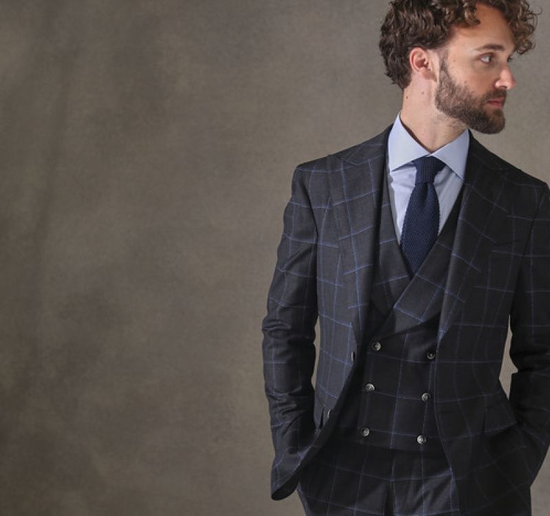Custom vest detailing at Bhambi's NYC – bespoke waistcoat with personalized lining, lapels, and hand-stitched buttons