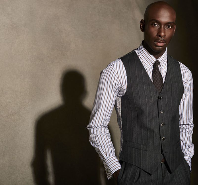 Custom vest detailing at Bhambi's NYC – bespoke waistcoat with personalized lining, lapels, and hand-stitched buttons